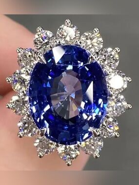 Blue Zirconia Halo Ring with White CZ Accents